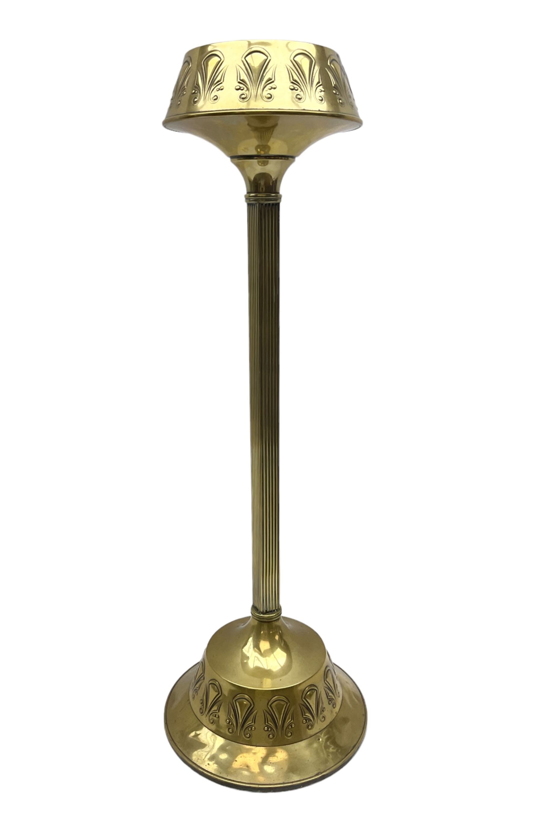 Early 20th century Daalderop of Holland Art Nouveau brass smokers stand, the square sided column stem raised upon circular spreading base with mounted ash tray decorated with typical Art Nouveau stylised motifs, with mark beneath, H72cm
