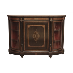  Victorian ebonised and amboyna credenza, central panelled cupboard with scrolled inlays, enclosed by two curved glazed doors, turned and fluted columns with gilt metal Corinthian capitals, W154cm, H107cm, D41cm  
