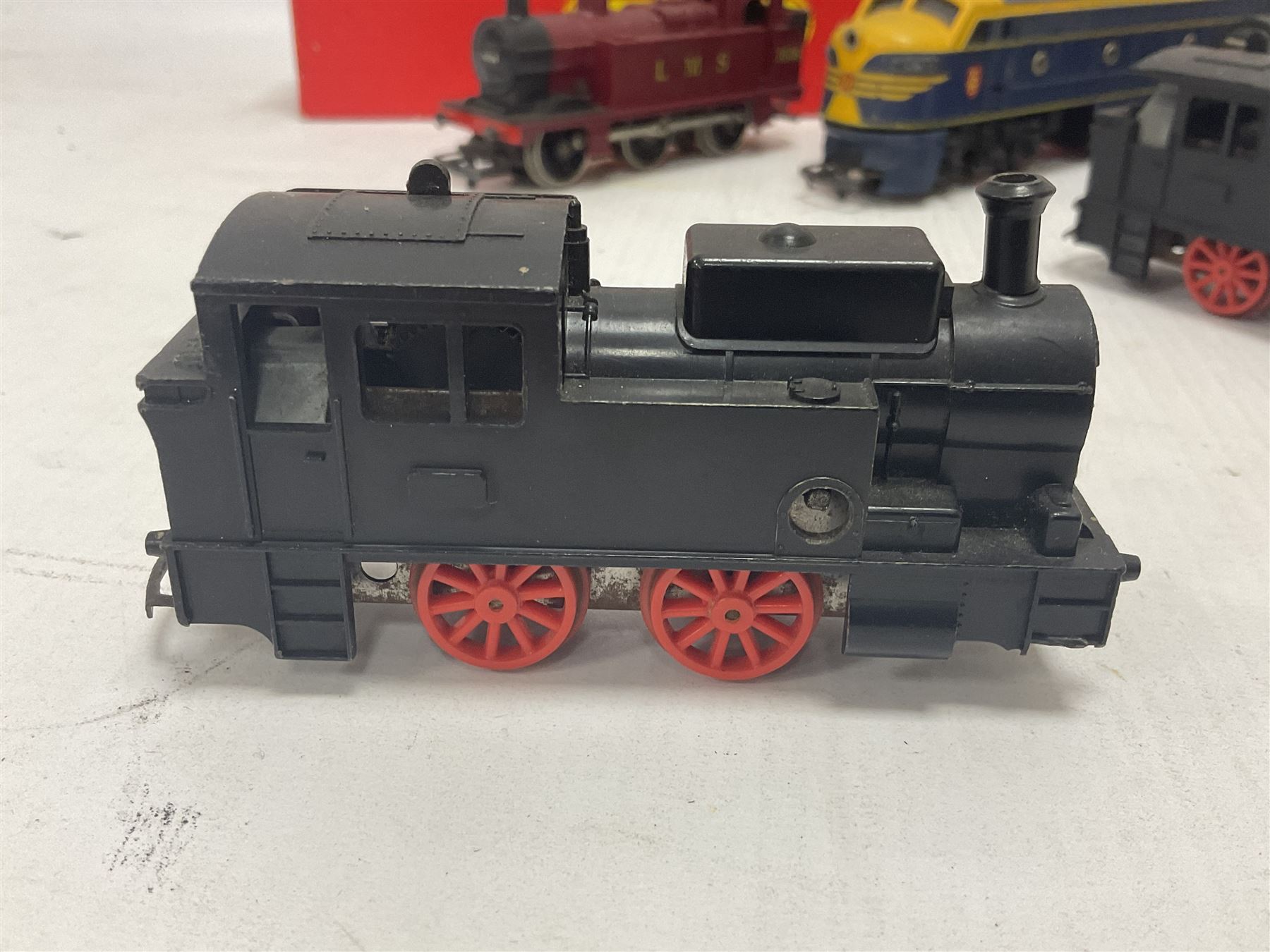 Hornby/Tri-Ang ‘00’ gauge - nine locomotives to include Britannia Class ‘Britannia’ 4-6-2 no.70000 in BR green; Class M7 4-4-0 Tank no.30027 in BR black; Princess Class ‘Princess Victoria’ 4-6-2 no.46205 in BR black; in original boxes; further loose models Princess Class ‘Princess Elizabeth’ 4-6-2 no.46201 in BR green; Class 3F 0-6-0 tank no.7606 in LMS crimson; TR double ended diesel locomotive; three further tank locomotives and one loose tender (10) 