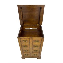 Titchmarsh & Goodwin - oak cabinet, enclosed by two doors with false drawers, on bracket feet