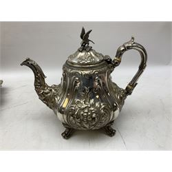 Victorian four piece silver plated tea service, comprising teapot, coffee pot, milk jug, decorated in relief with, scrolls and foliage, the tea and coffee pots with bird finial and and ivory insulators, upon a circular salver, salver D43cm
This item has been registered for sale under Section 10 of the APHA Ivory Act