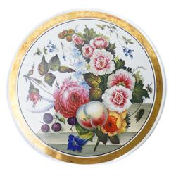 Pair of 19th century French porcelain circular plaques, each painted with fruit and flowers within a gilt lined border D23cm