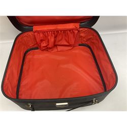 Brass oil lamp, with etched floral glass shade, leather Gladstone style doctors bag, leather satchel and vintage vanity case, three graduating wooden giraffes and other wood and metal ware, lamp H54cm