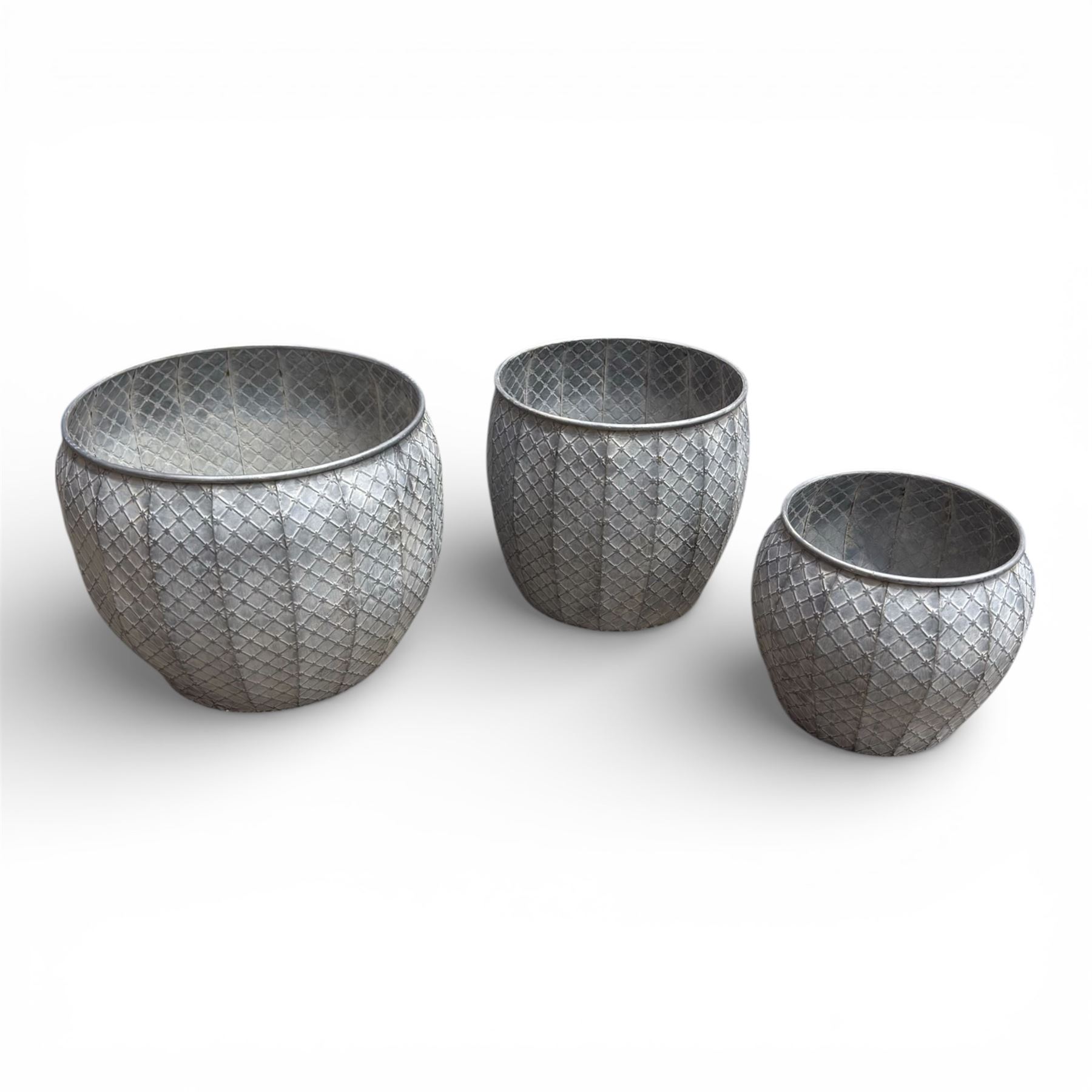 Set of three graduating galvanised circular planters