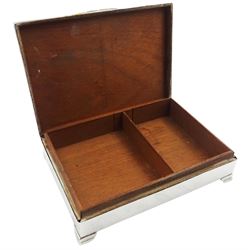 1960's silver mounted cigarette box, of rectangular form upon four bracket feet, the engine turned cover with central panel engraved with initials 'W.L' opening to reveal a soft wood lined interior with division, hallmarked Harman Brothers, Birmingham 1965, H4cm W16.5cm D11.5cm