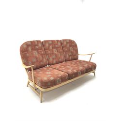 Ercol three seat Windsor sofa with loose cushions, spindle back, turned supports