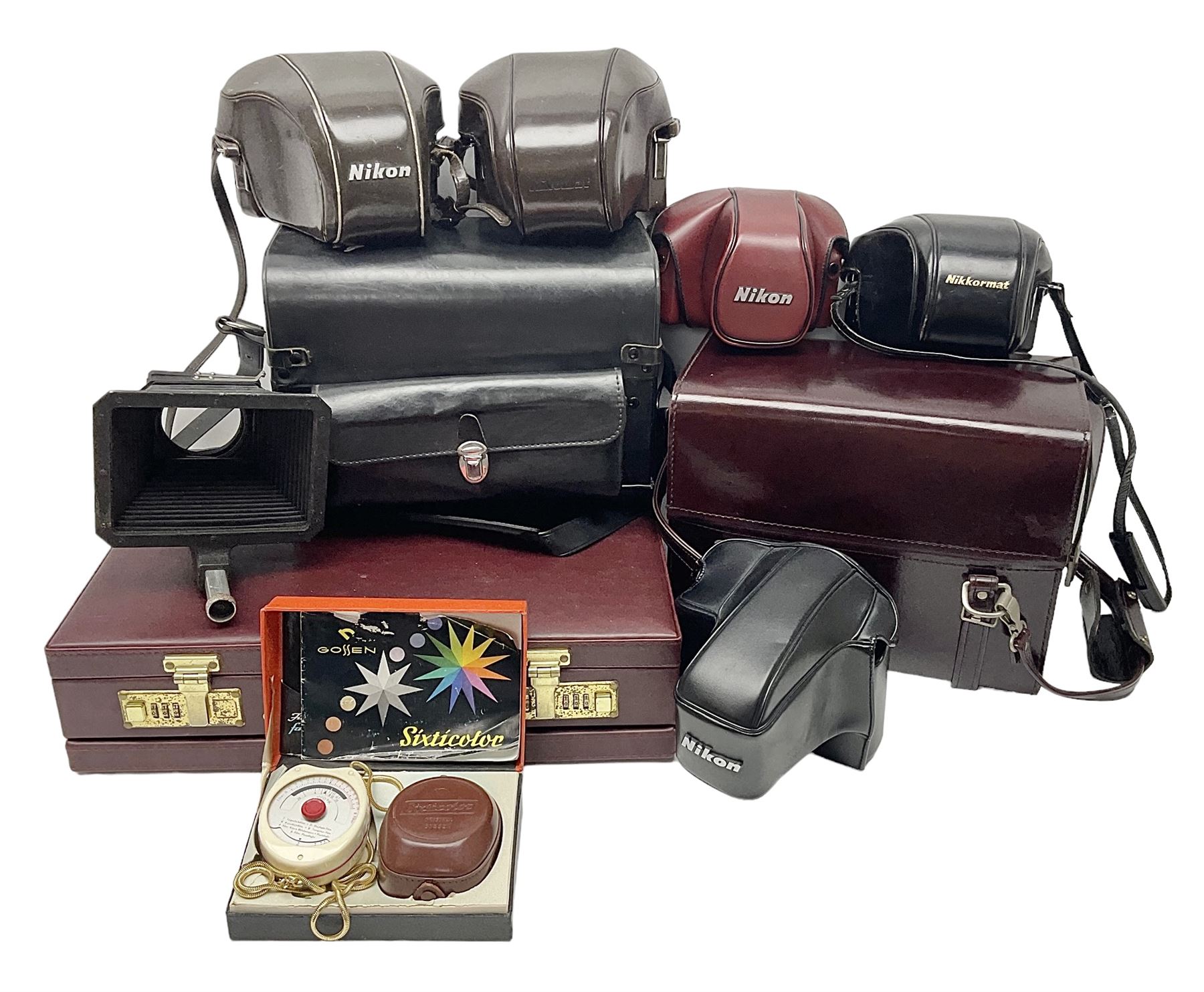 Collection of leather camera cases, to include Nikon ever ready cases and two larger cases, together with Gossen Sixticolor light meter, in box and other camera equipment 