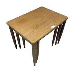 G-Plan - teak nest of three tables, rectangular top raised on turned supports