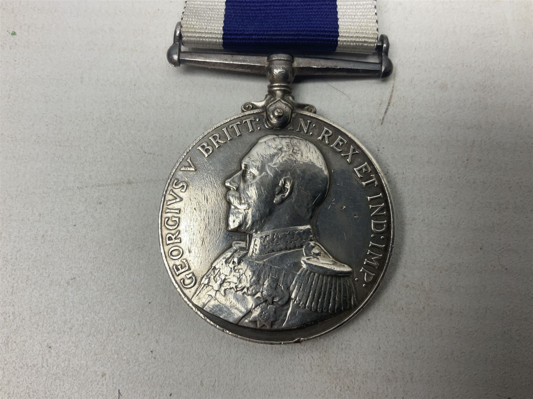 George V Naval long Service and Good Conduct Medal awarded to M.36831 W. Cox R.P.O. H.M.S. Vivid; with ribb