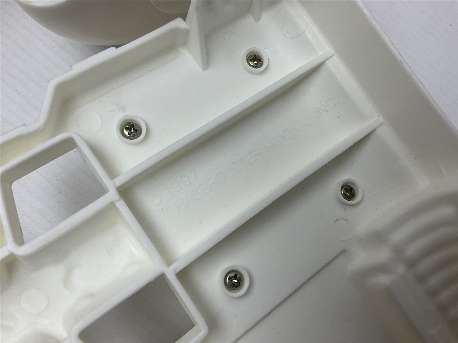 Action Man - large collection of 1960s and later figures and accessories including Spaceman with ATLRV vehicle; two figures marked 'Made in England by Palitoy under licence from Hasbro 1964'; twenty-five assorted weapons; radio backpacks; kit bags; twenty-one pairs of boots; football boots and snow shoes; metal diver's boots and three pairs of flippers; two pairs of jackboots; roller skates; various tunics, trousers, flying suits, jumpers, belts etc; twenty helmets, berets, busby, kepis, submariner etc; and quantity of other accessories