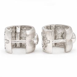 Pair of 18ct white gold diamond brushed and polished hoop earrings, each rubover set with three round brilliant cut diamonds, to a pierced design back, stamped 750