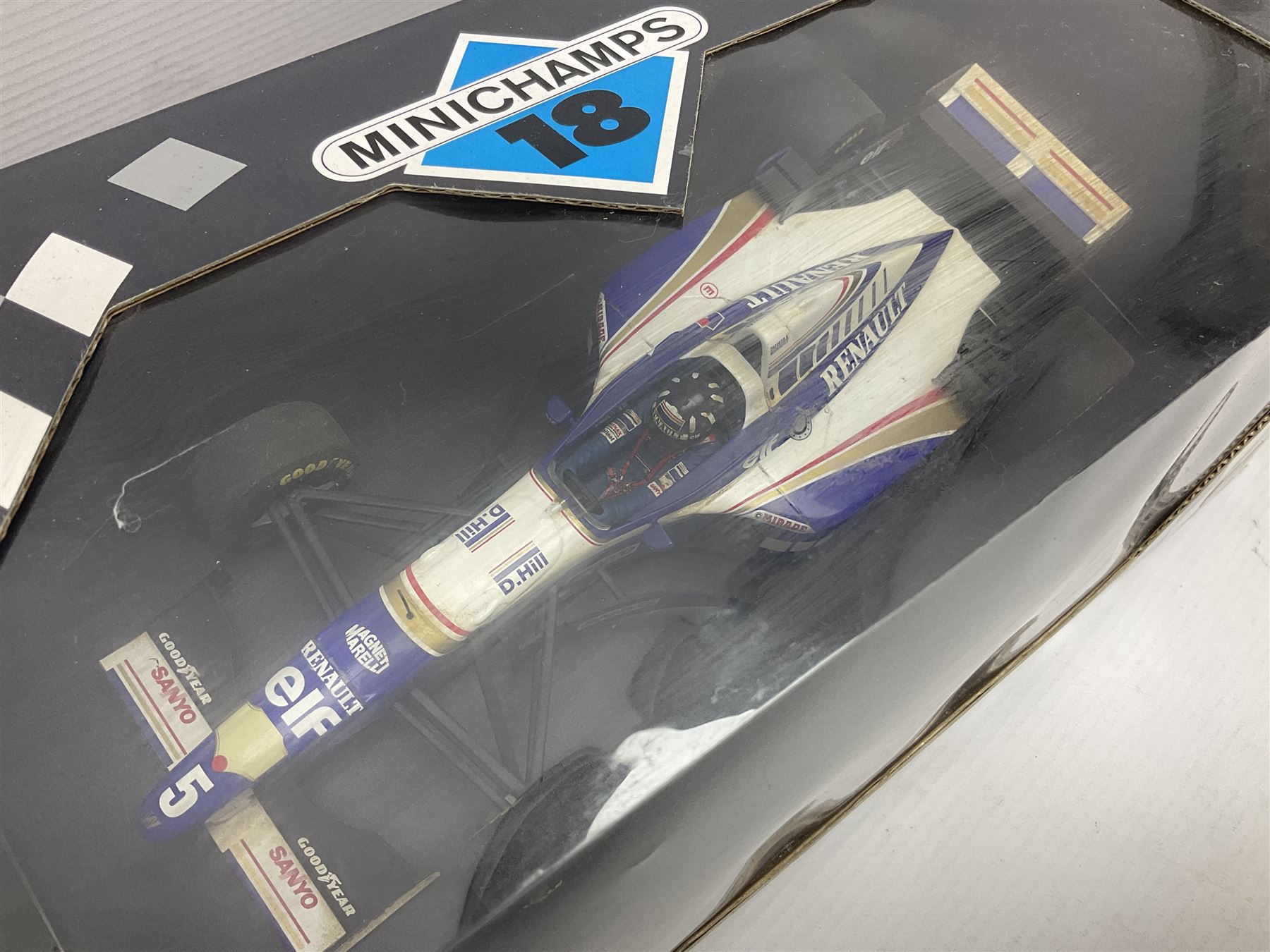 Three Minichamps '18' 1:18 scale die-cast racing cars - Jordan Peugeot 196 1996 R. Barrichello; Benetton Renault B196 G. Berger; and Williams Renault FW18 D. Hill; all boxed (3)