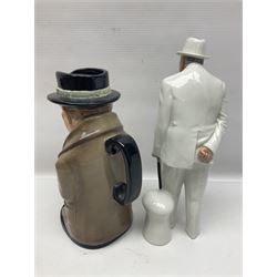 Royal Doulton Sir Winston Churchill figure HN3057, together with Winston Churchill toby jug, and three character jugs 