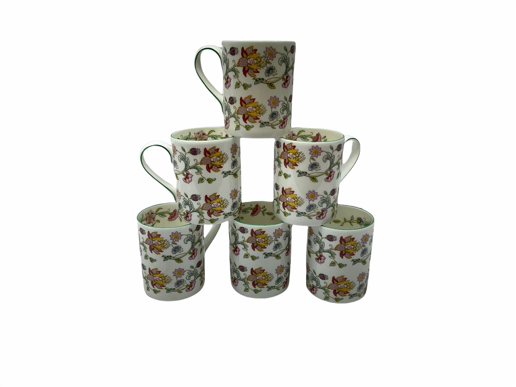 Minton Haddon Hall pattern tea and dinner wares, including basket dish, two covered tureens, six dinner plates, eight dessert plates, twelve tea plates, six soup bowls, six cereal bowls, teapot, coffee pot, milk jug, covered sucrier twelve tea cups and saucers, six mugs, footed bon bon dish, pair of candlestick holders, cake knife and slice etc (81)