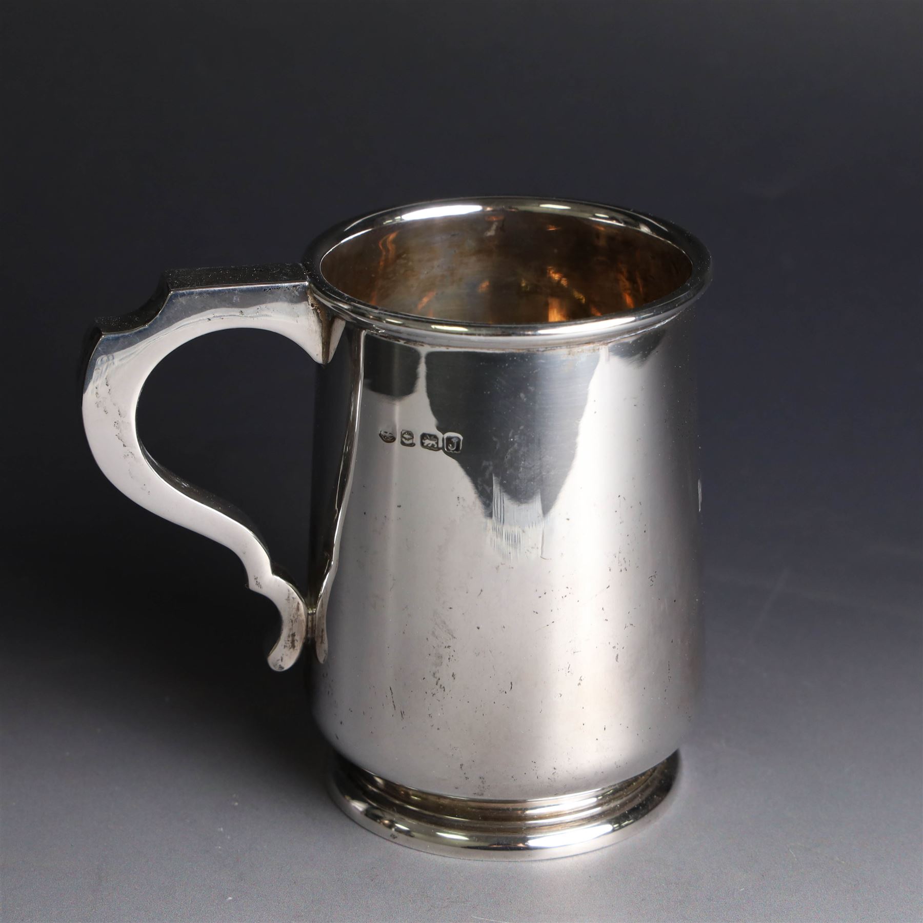 1930s silver christening mug, of slightly tapering cylindrical form and C scroll handle, engraved with initials to body, hallmarked Birmingham 1933, maker's mark worn and indistinct, H10cm