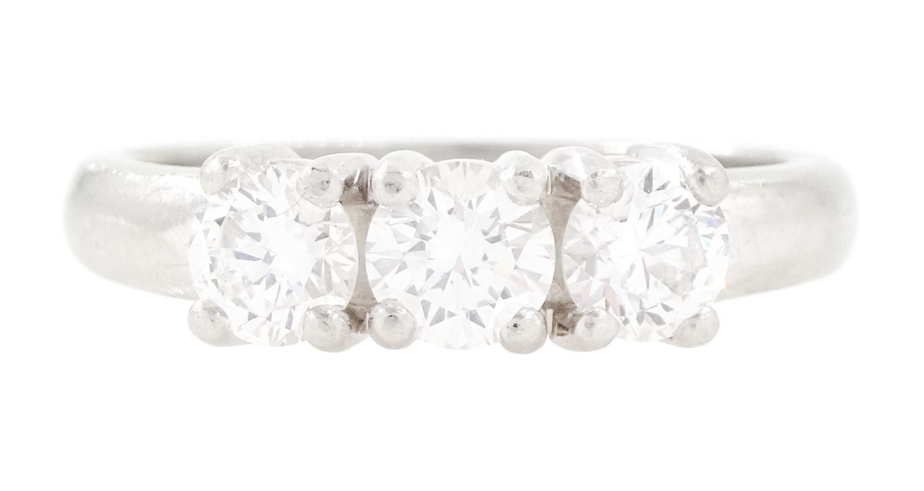 Platinum diamond three stone ring, each four claw set with a round brilliant cut diamond, hallmarked, total diamond weight approx 1.00 carat