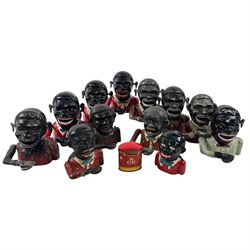 Collection of cast iron Jolly money boxes 