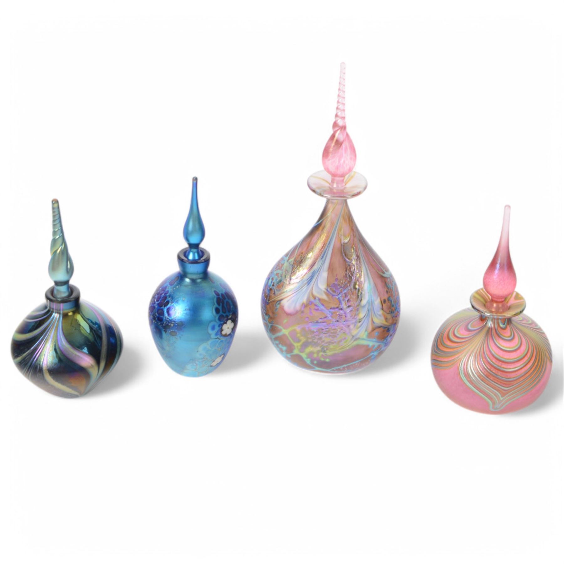 Okra glass scent bottle of ovoid form decorated with iridescent blue design with stylised flowers and leaves, with box, together three other Okra scent bottle with iridescent design, all with original boxes  