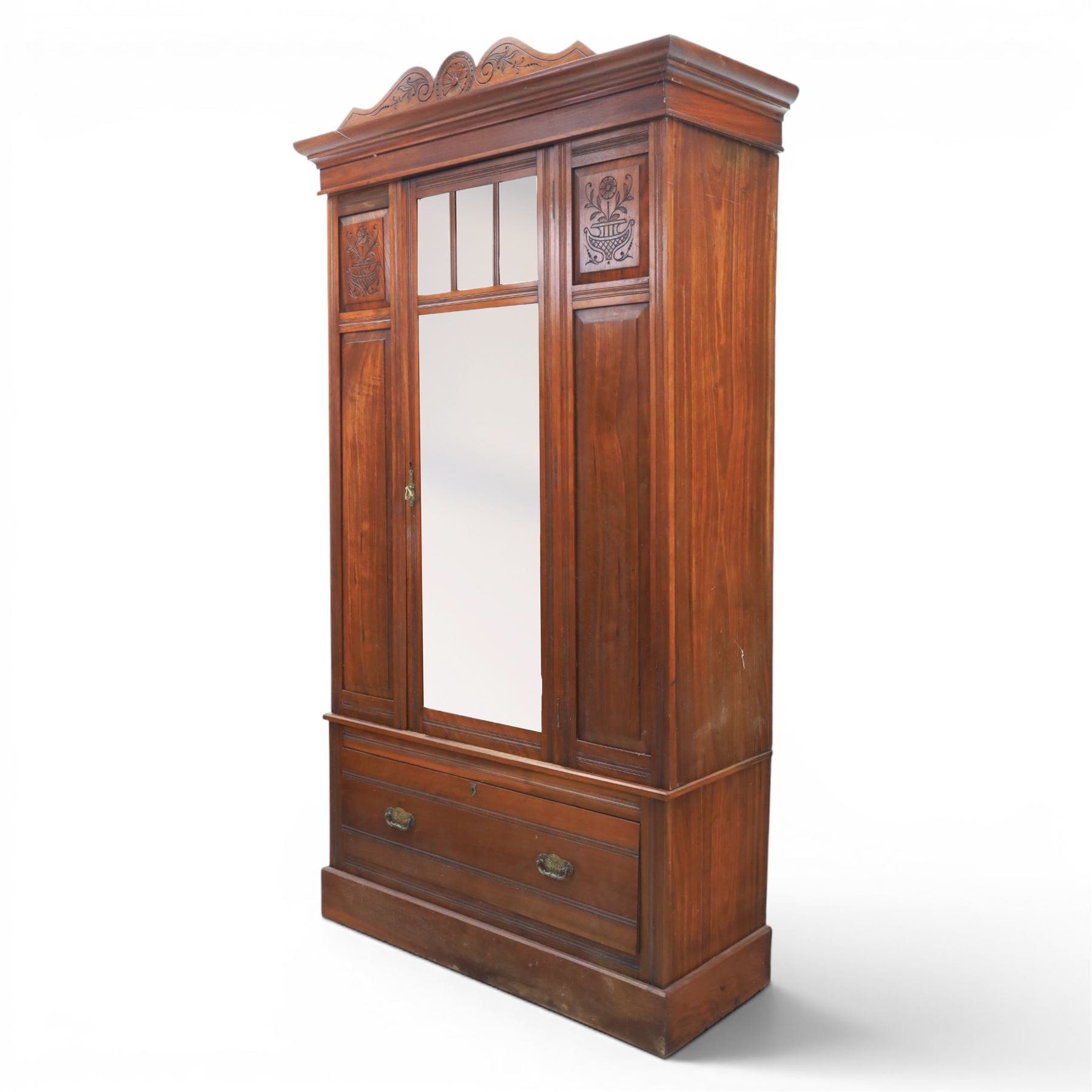 Edwardian walnut wardrobe, featuring single sectional mirror door with bevelled panes, single drawer to base