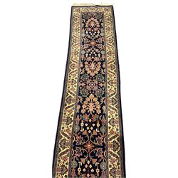 Persian design runner rug, navy ground with beige border
