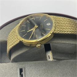 Gruen Precision gentleman's quartz wristwatch, with stone set black dial, on a stainless steel gilt metal strap, in original box