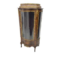 Early 20th century French kingwood vitrine or display cabinet, decorated with applied foliate cast band, serpentine glazed door and sides, inlaid with marquetry decoration of floral bouquets and branches, cartouche mounts to the apron, raised on cabriole supports