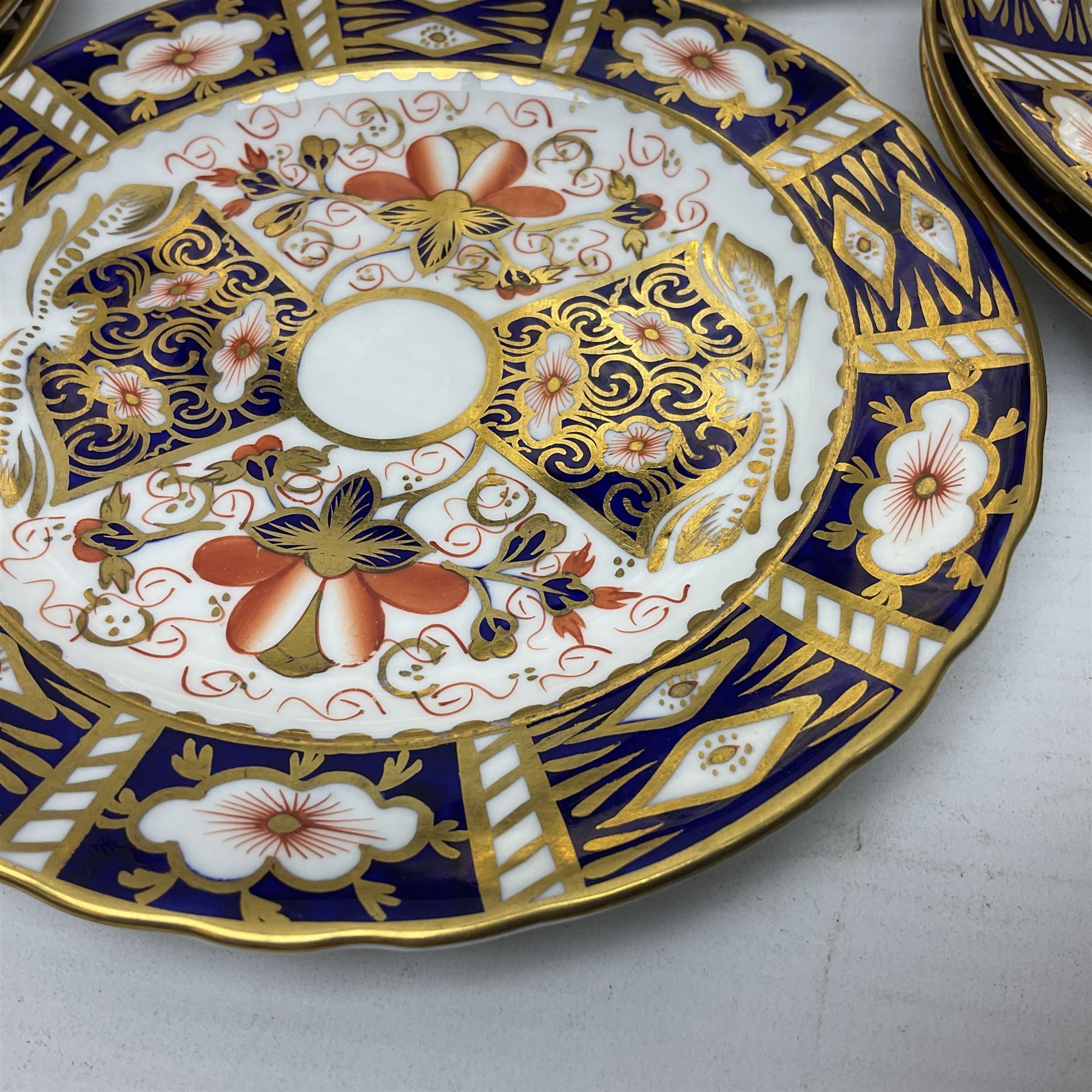 Ten Royal Crown Derby plates all in imari pattern 2451, in various sizes, comprising five D15.5cm, four D18cm and one D23cm