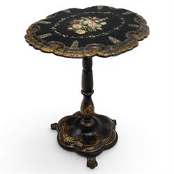Victorian papier mache table, tilt top with painted decoration and mother of pearl inlay, raised on a baluster column shaped base terminating in pad feet