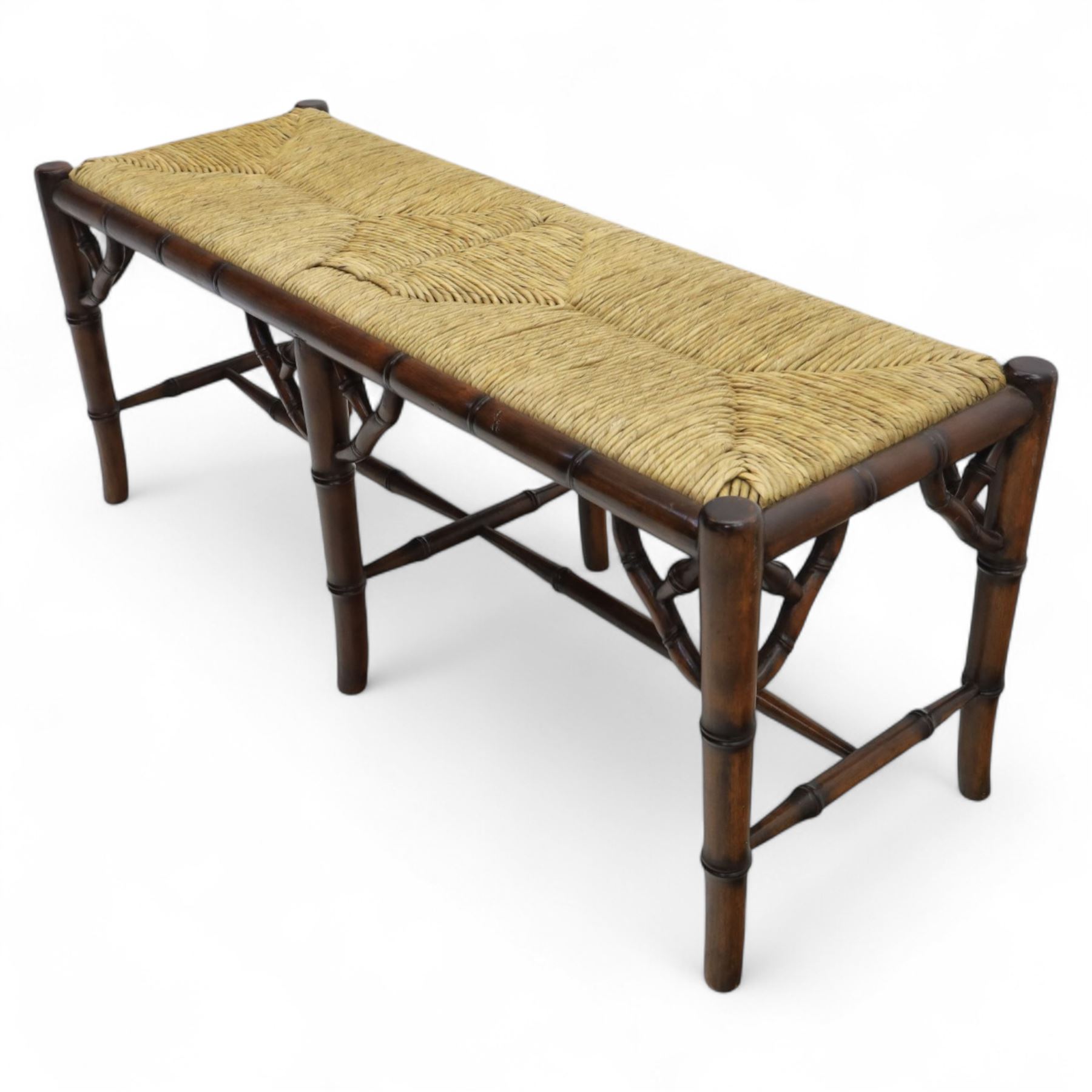 Faux bamboo long stool, stained beech frame with rectangular rush woven seat, rounded rail sides over ring-turned supports, united by side and end stretchers