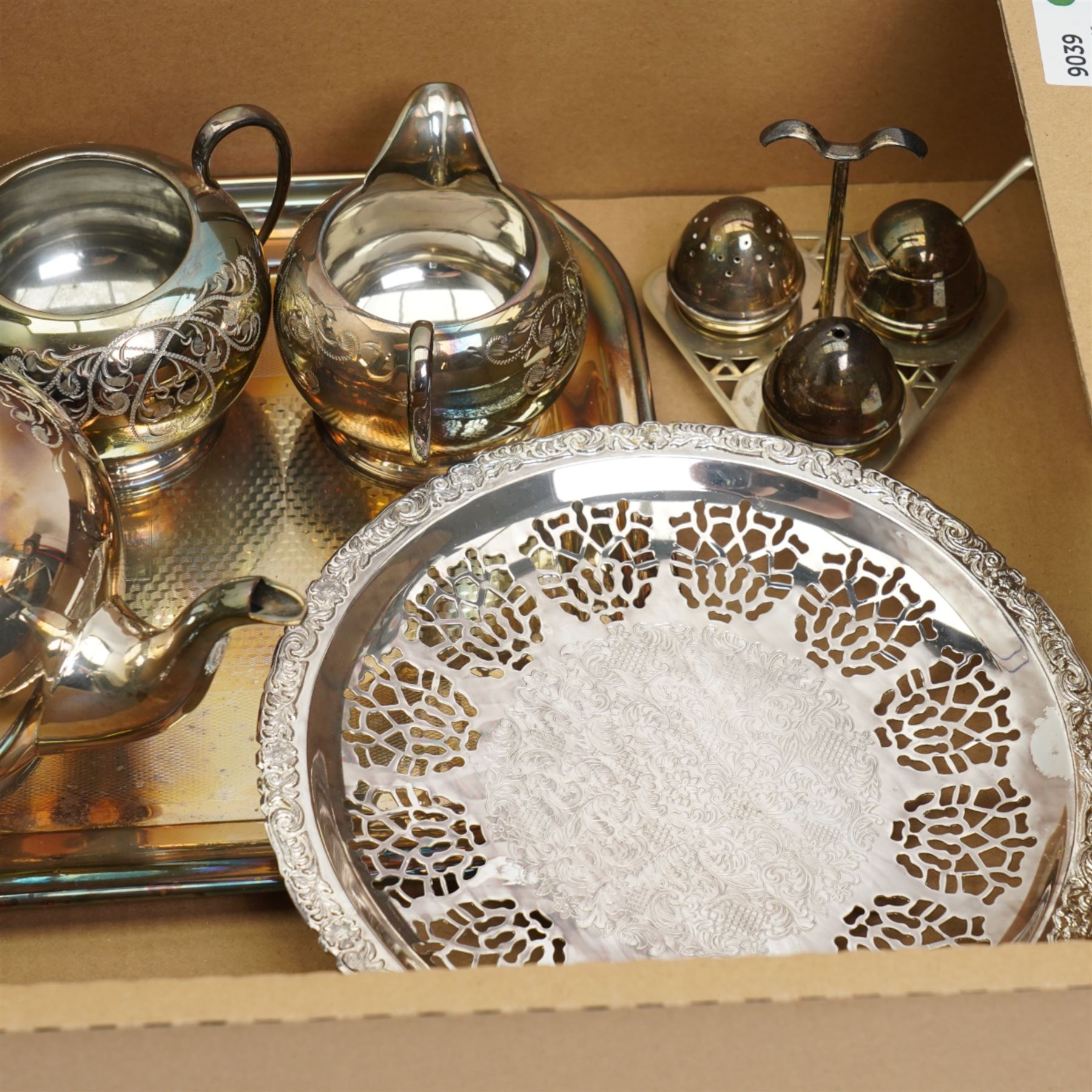 Collection of silver plate, to include apex cruet set with blue glass liners, matching teapot, coffee pot, milk and sugar bowls, and a plated tray, folding cake stand etc