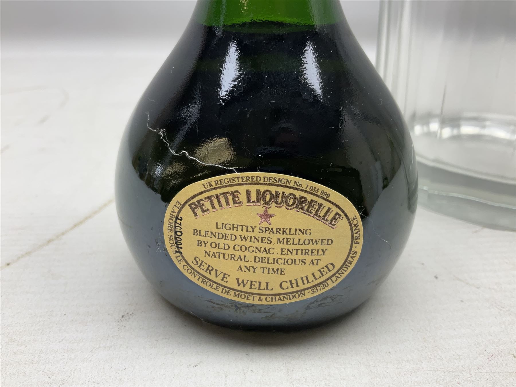 Moet and Chandon Petite Liquorelle glass ice bucket and small bottle of Moet, 10% vol 200ml, bucket H13cm