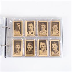 Collection of Edwardian and later Football related trading and cigarette cards, including forty-nine of fifty 1906 Ogden's Football Club Colours, 1922 PALS Footall series, ninety of one hundred 1925 Gallaher Famous Footballers, complete set of forty-four 1926 Ogden's Captains of Association Football Clubs and Colours, complete set of fifty 1927 Players Football Caricatures by MAC,  complete set of fifty 1927 Players Football Caricatures by RIP,  complete set of fifty 1930 Players Association Cup Winners, complete set of 50 1933 Ogdens AFC Nicknames etc, housed in brown cigarette card album