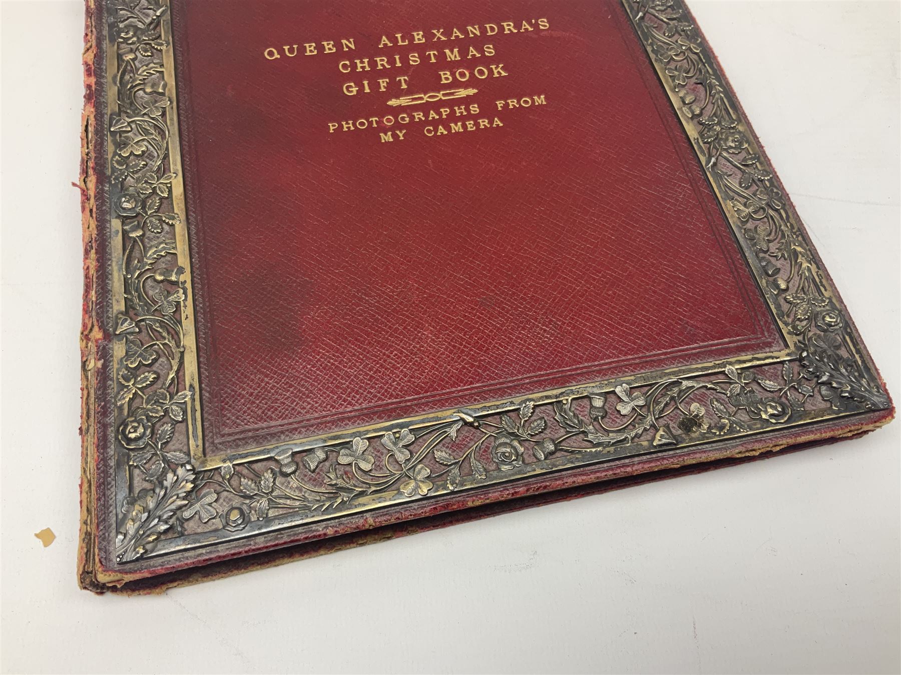Queen Alexandra's Christmas Gift Book: Photographs From My Camera, Daily Telegraph, 1908, with silver mounted cover, the pierced frame modelled as flowers of The Union, hallmarked London 1908, no visible makers mark, Famous Water-colour painters I.-Frank Brangwyn, R.A., and II. W. Russell Flint, A.R.A., The Studio Limited, 1928, each with colour plates, John L Stoddard's Portfolio of Photographs of Famous Cities Scenes and Paintings, The Werner Company, etc., in one box 
