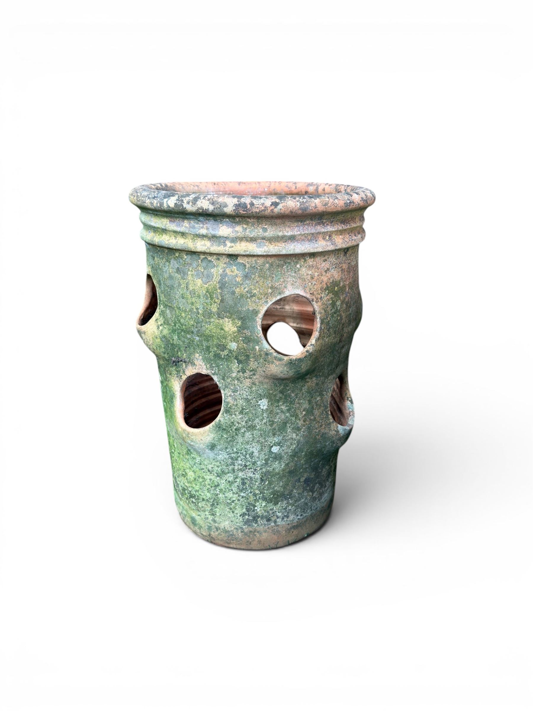 Set of five weathered terracotta strawberry pots, circular form with ribbed top