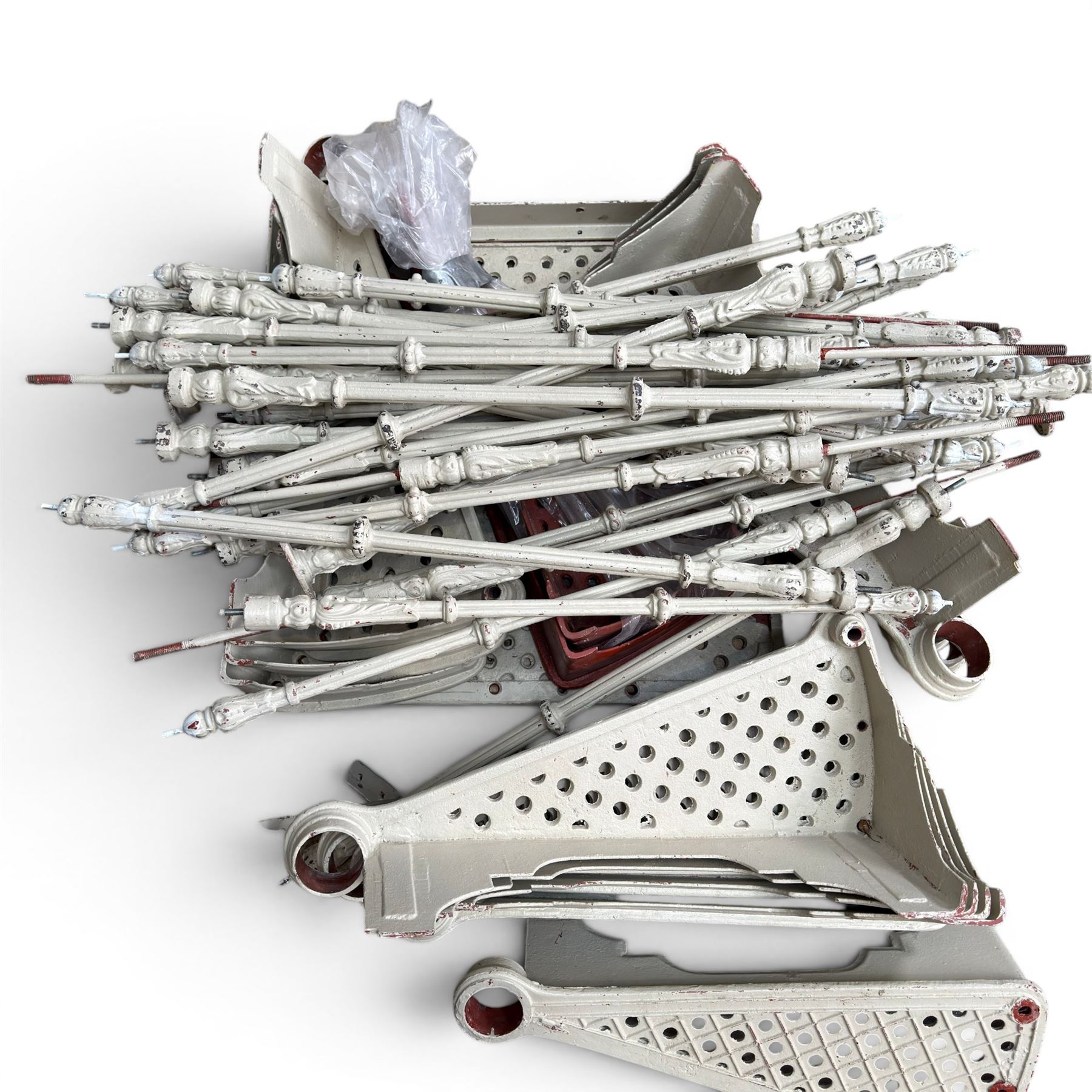 Victorian design cast iron spiral staircase, sixteen pierced treads, ornate balustrades, with landing and handrail painted in cream finish, height of pole 250cm, width of steps 74cm