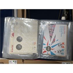 Approximately one hundred and fifteen Royal Mint coin covers, in two ring binder folders and loose, together with approximately 53 grams of Great British pre-1920 and approximately 68 grams of Great British pre-1947 silver threepence coins, and a small quantity of further pre-decimal coins
