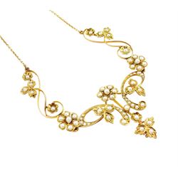Edwardian gold split pearl flower head and foliate necklace, stamped 15ct