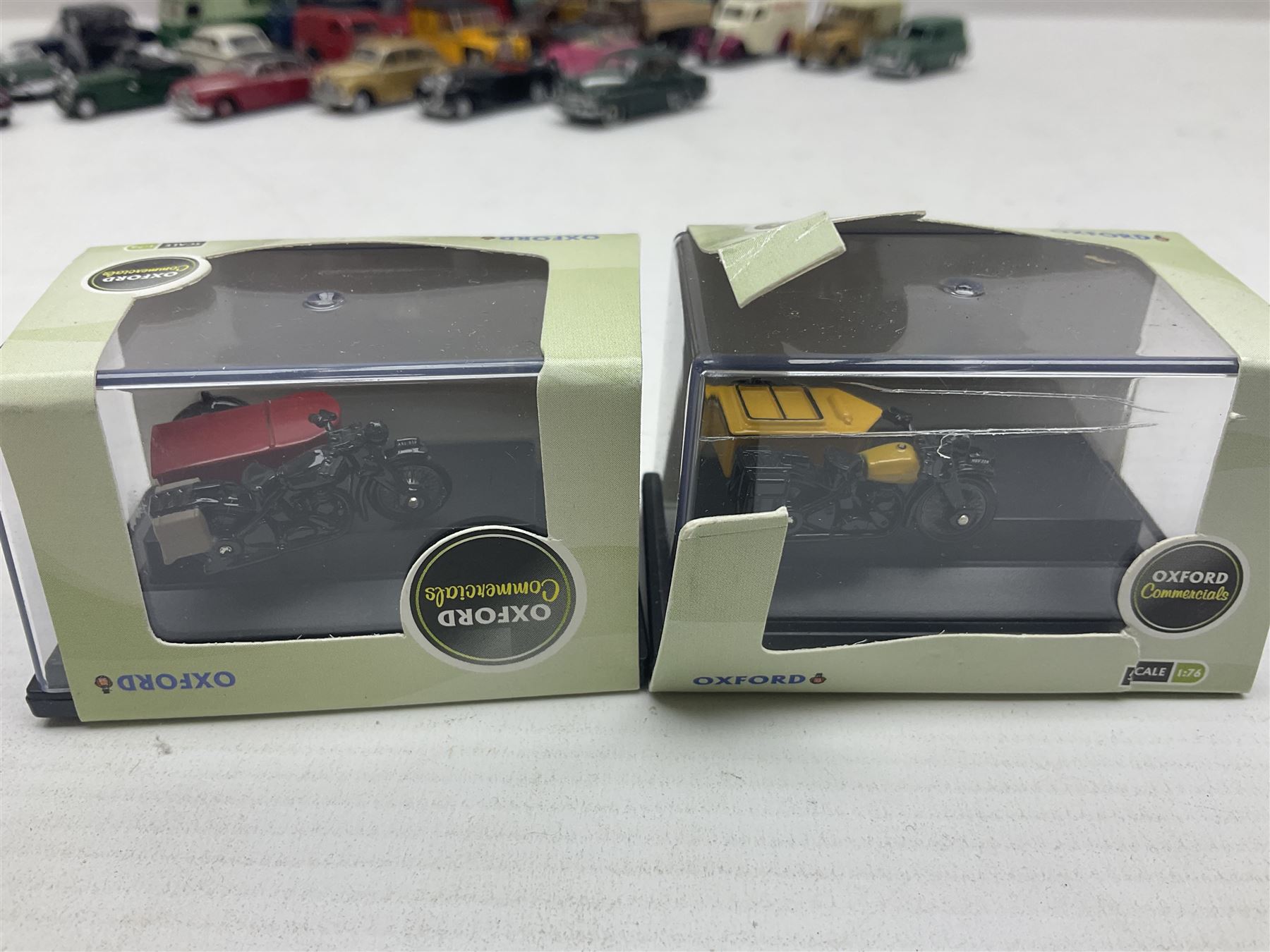 Over forty 1:76 scale die-cast models of cars and commercial vehicles; some boxed; and eight small scale models of motorcycles; all unboxed