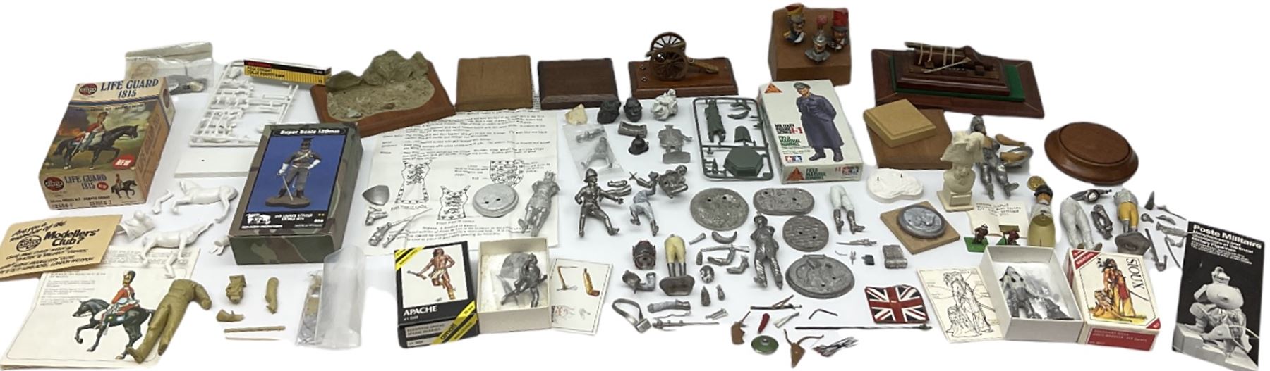 Quantity of cast metal figures and busts by Ceremonial Studios, Amati Miniatures etc including historical soldiers, American Native Indians etc predominantly in unmade/part constructed and unpainted kit form; together with associated accessories, wooden plinths etc; and boxed plastic soldiers
