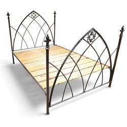 Gothic design wrought iron double bed, with silvered hammered finish, metal frame with lar...