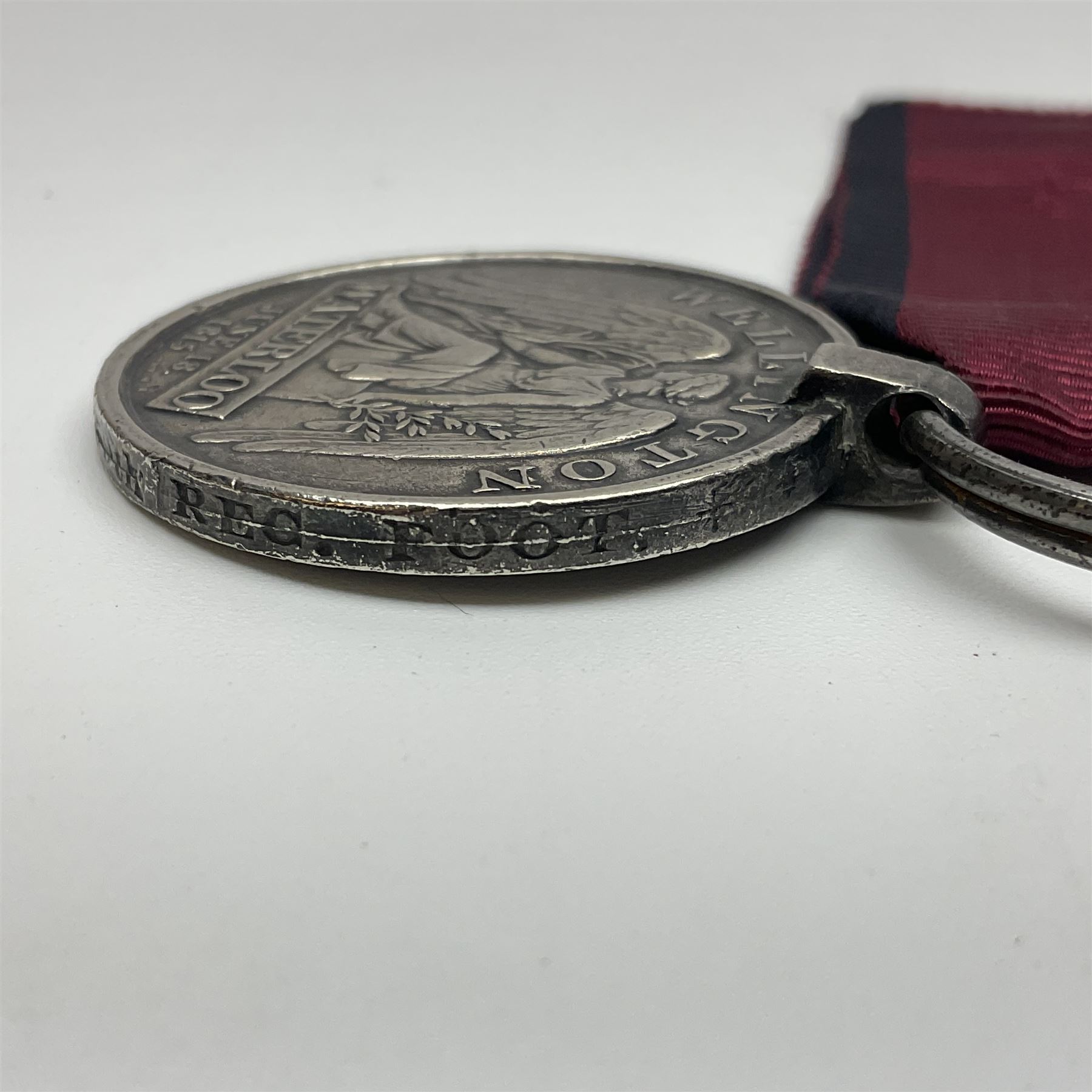 Copy of a Waterloo Medal named to William Rose, 1st Battalion, 79th Regiment of Foot with ribbon