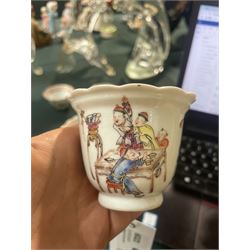 Set of Chinese 20th century tea wares, comprising three bowls of graduating sizes, teacup, spoon rest and small plate, decorated with scenes of figures around a table, each with scalloped rim, largest bowl D12cm