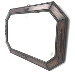Early 20th century oak framed bevel edge mirror, W82cm, H54cm