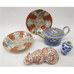  18th century Chinese Export blue and white teapot with applied gilt decoration, two Chinese porcelain bowls with polychrome enamelling, Chinese Imari cat and miniature blue and white vase (4)   