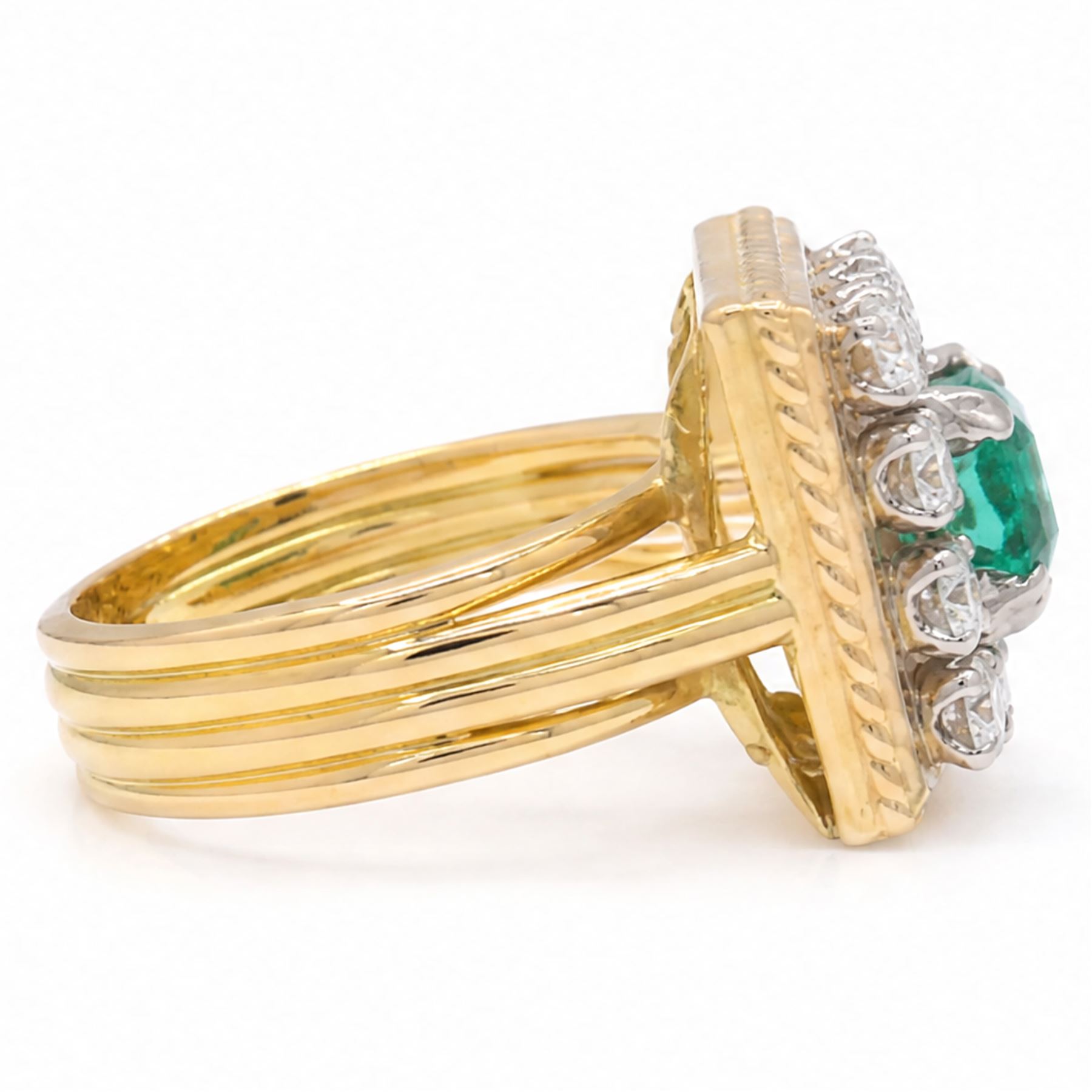 French 18ct gold emerald and diamond cluster ring, single octagonal cut emerald of approx 1.00 carat, surrounded by twelve round brilliant cut diamonds in a square setting, Eagle hallmark, total diamond weight approx 0.85 carat