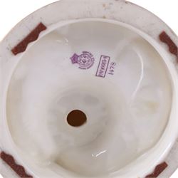 Royal Worcester pair of blush ivory candlesticks, modelled in the rococo style of scrolling foliate design upon a circular spreading base, gilt-heightened, puce mark to base and numbered RN160134 and 1478, H32cm