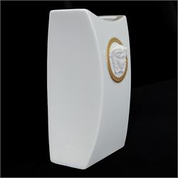 Rosenthal Versace Gorgona vase, of concave form, decorated in relief with medusa masks and gilt greek key borders upon a white ground, boxed, H17cm