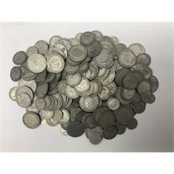 Approximately 1390 grams of Great British pre-1947 silver coins, including half crowns, two shillings / florins, shillings and sixpences