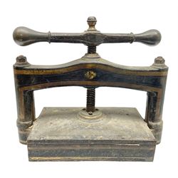 Heavy cast iron Victorian book press with striped gilt decoration, H42cm W50cm