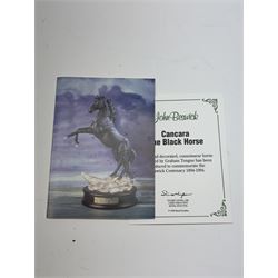 Beswick Cancara The Black Horse, designed by J. G. Tongue, modelled rearing horse on a naturalistic stony ground, upon a circular plinth with engraved title plaque, with certificate and in original box, H46cm 